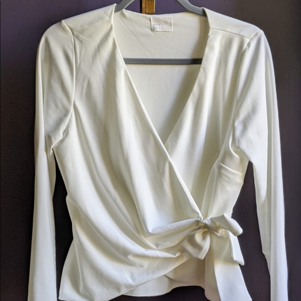 Pre-loved cross shirt.